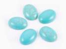 910423 Kaboszon turkus owal ok.: 10x8mm 2szt