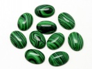910463 Kaboszon malachit owal ok.: 14x10mm 2szt